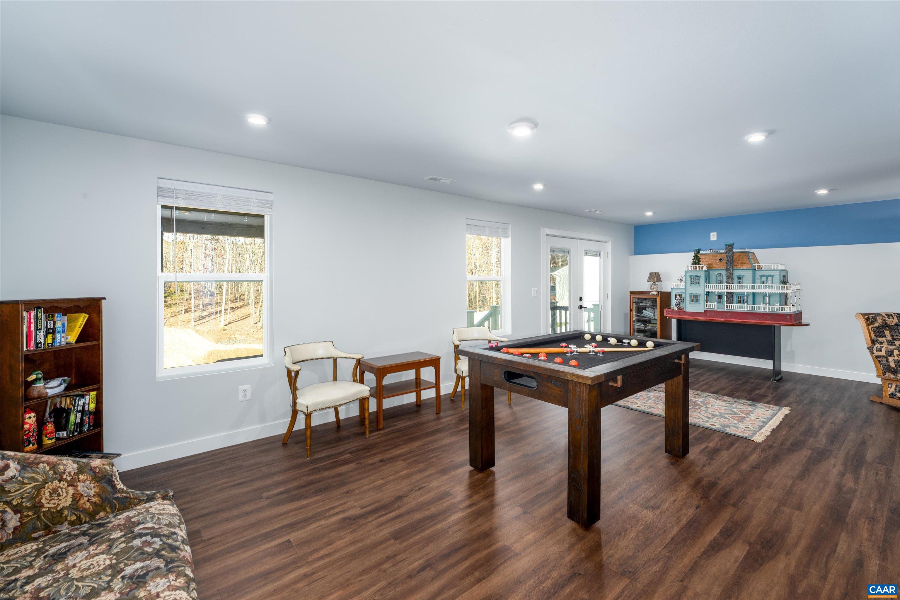93 Archer Drive Palmyra, VA 22963 - Photo 36 of 45 a living room with furniture a table and a window
