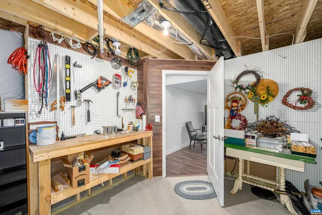 a utility room with lots of appliances and cabinets