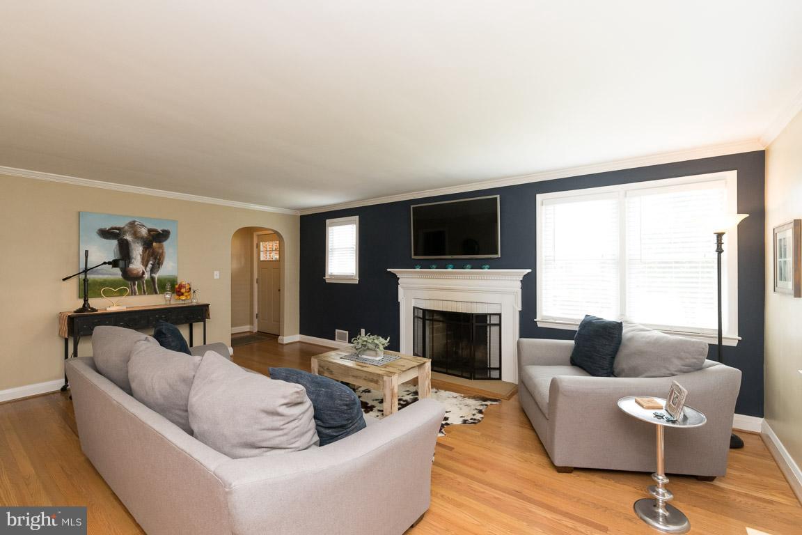 912 Lynvue Road Linthicum Heights, MD 21090 - Photo 17 of 27 Living Room with Wood Burning Fire Place