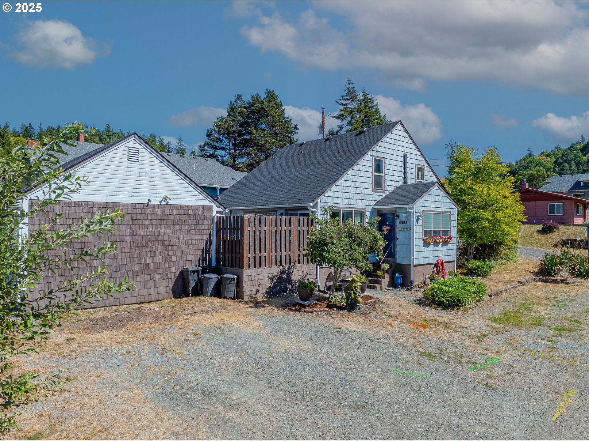 1753 20th Street Myrtle Point, OR 97458 - Photo 2 of 44 a front view of a house with sitting area
