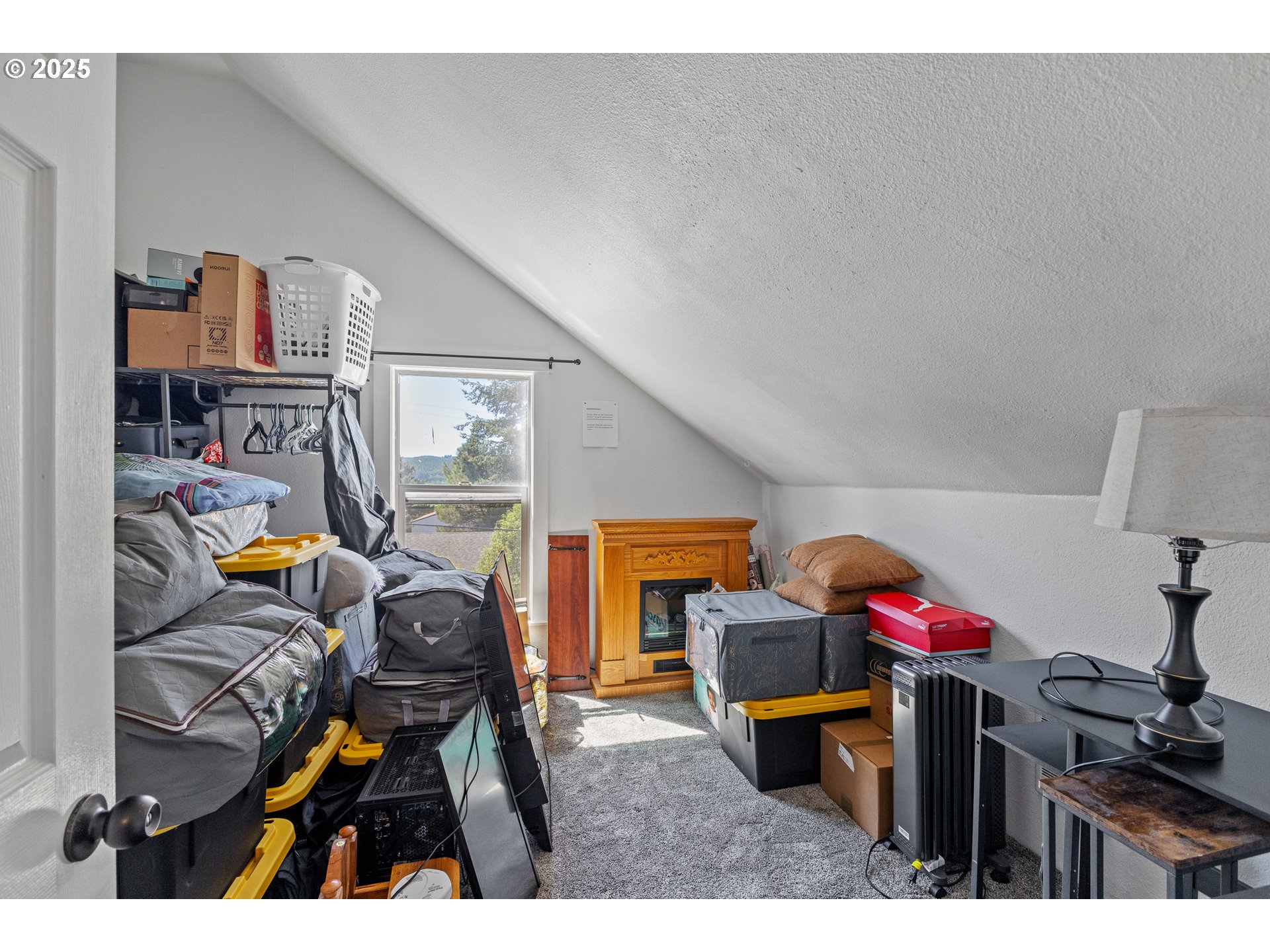 1753 20th Street Myrtle Point, OR 97458 - Photo 27 of 44 a view of living room filled with furniture and toys