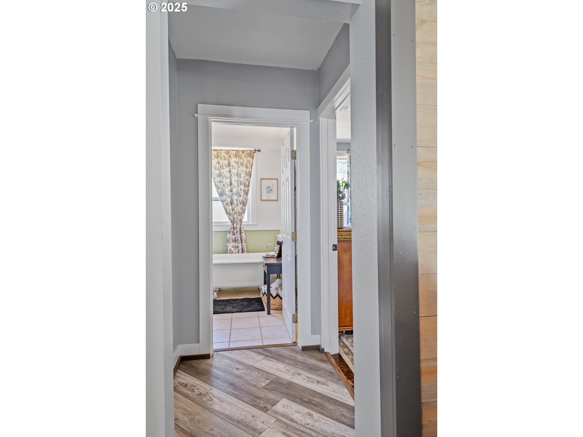 1753 20th Street Myrtle Point, OR 97458 - Photo 32 of 44 a view of a bedroom from a hallway