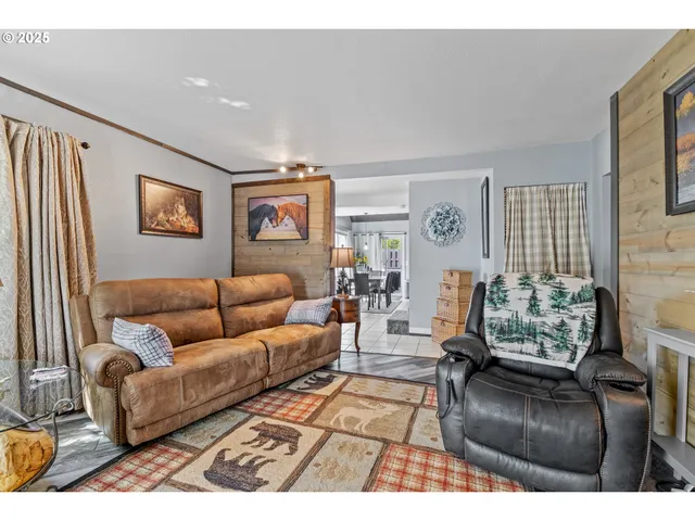 a living room with furniture and a couch