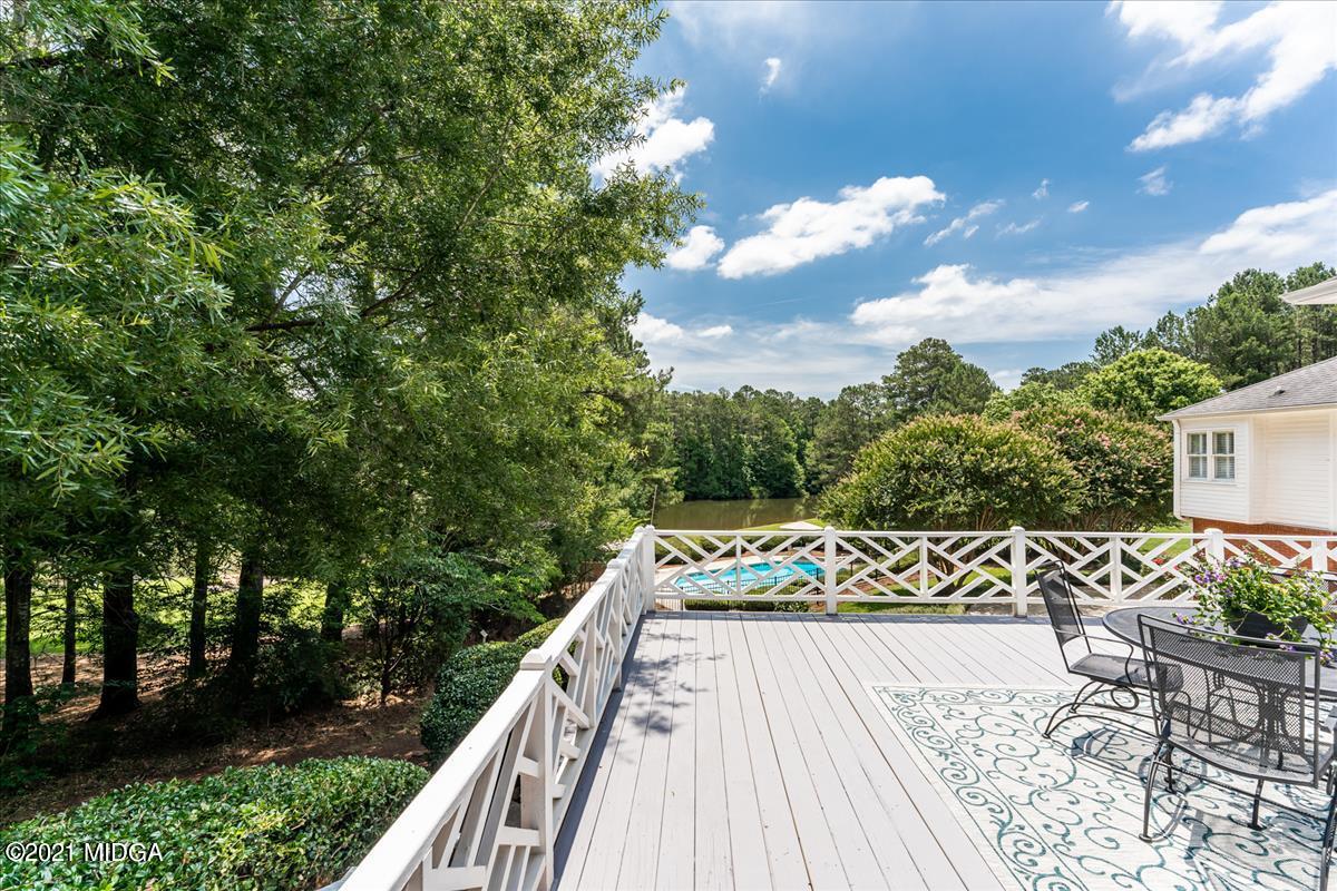 135 Rivoli Ridge Drive Macon, GA 31210 - Photo 29 of 46 a view of balcony with wooden floor and fence