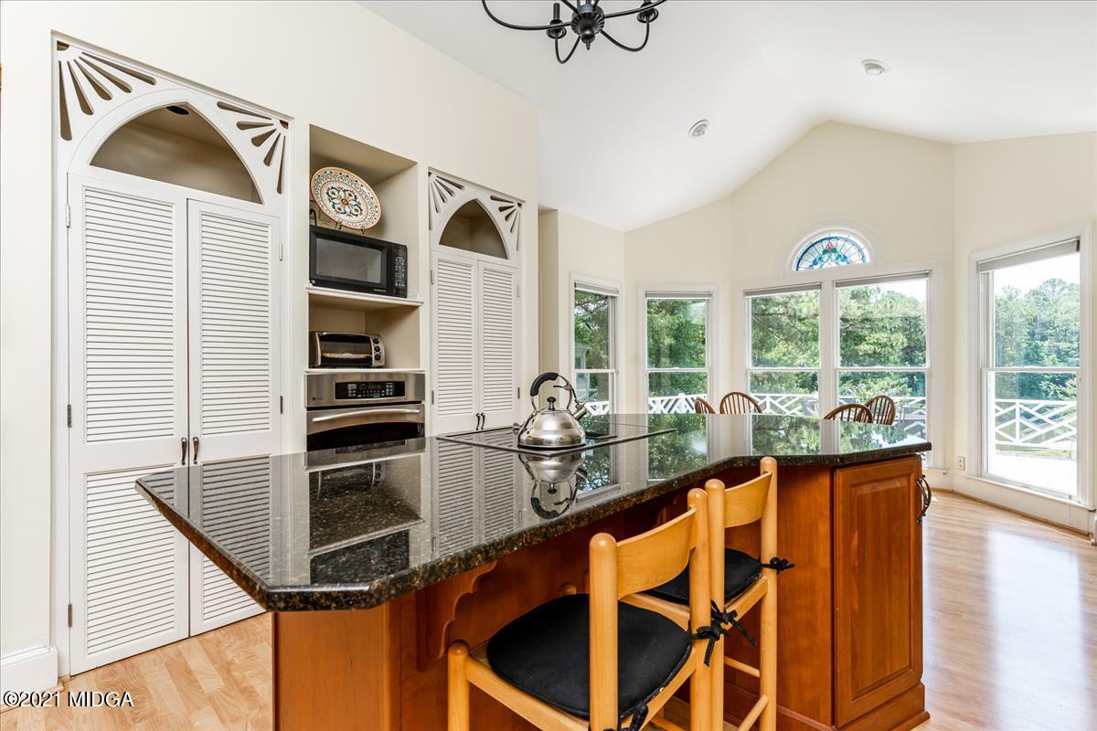 135 Rivoli Ridge Drive Macon, GA 31210 - Photo 10 of 46 a view of a kitchen with furniture and windows