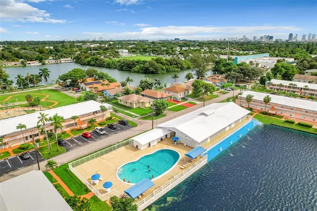 an aerial view of a pool patio swimming pool and outdoor space