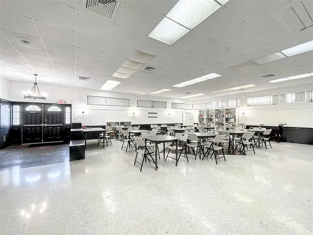 a group of people sitting in a room