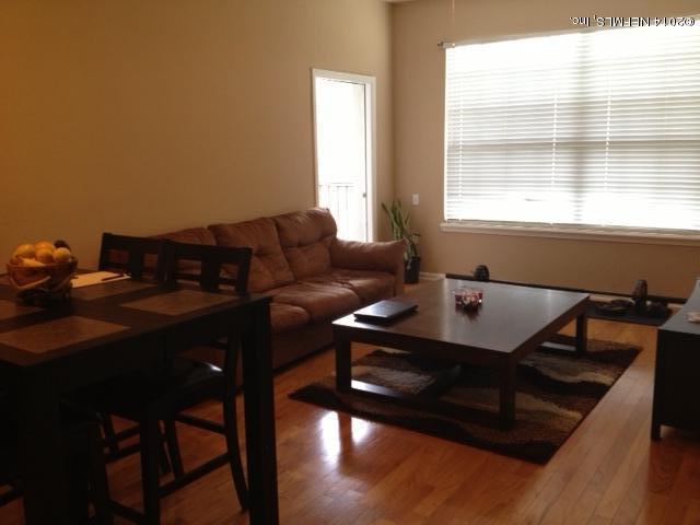 10550 Baymeadows Road, Unit 727 Jacksonville, FL 32256 - Photo 1 of 12 living closed blinds