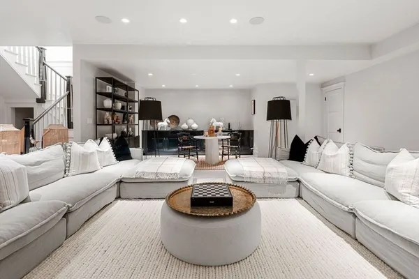 a bedroom with furniture and a couch