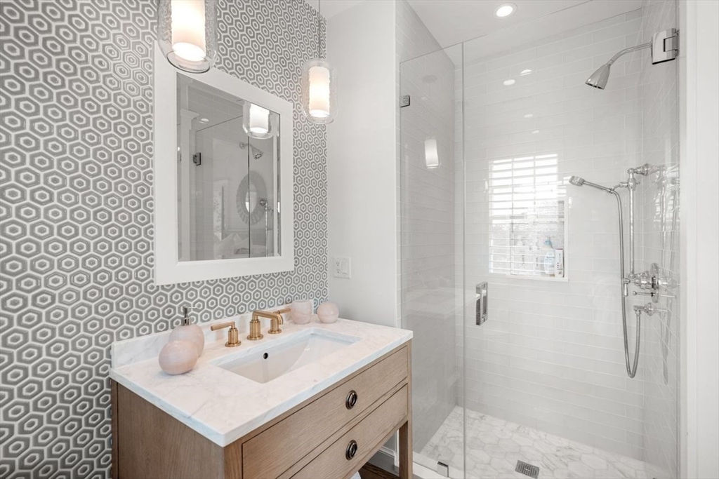 34 Brewster Road Nantucket, MA 02554 - Photo 28 of 40 a bathroom with a sink and a mirror