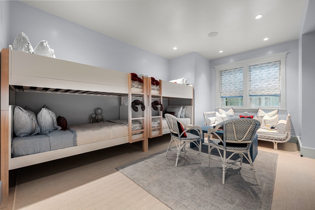 34 Brewster Road Nantucket, MA 02554 - Photo 29 of 40 a bedroom with furniture and a couch