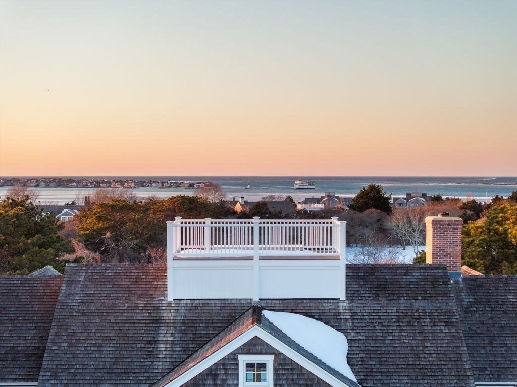 34 Brewster Road Nantucket, MA 02554 - Photo 39 of 40 a view of a city from a terrace