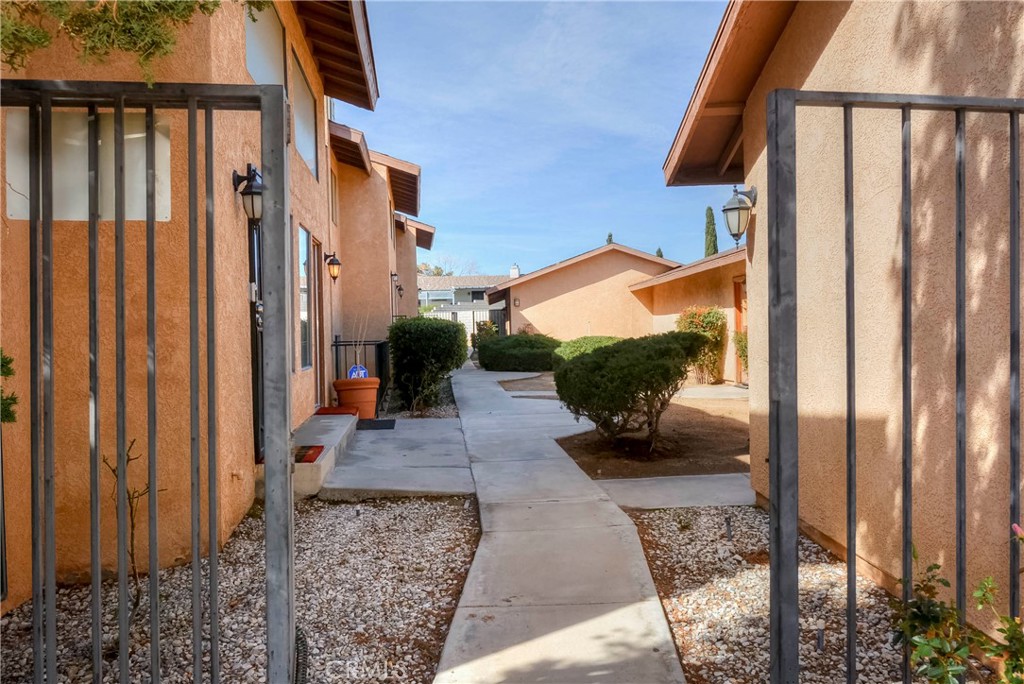 16462 Kalo Road Apple Valley, CA 92307 - Photo 11 of 22 a view of a porch with furniture