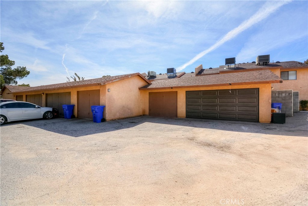 16462 Kalo Road Apple Valley, CA 92307 - Photo 19 of 22 a view of a car parking garage