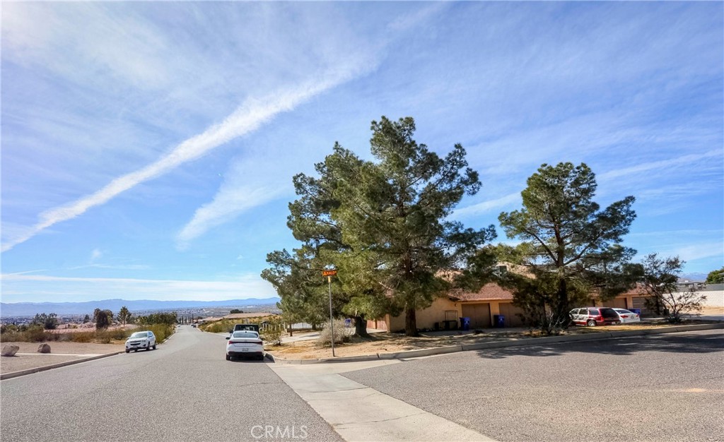 16462 Kalo Road Apple Valley, CA 92307 - Photo 21 of 22 a view of street with cars