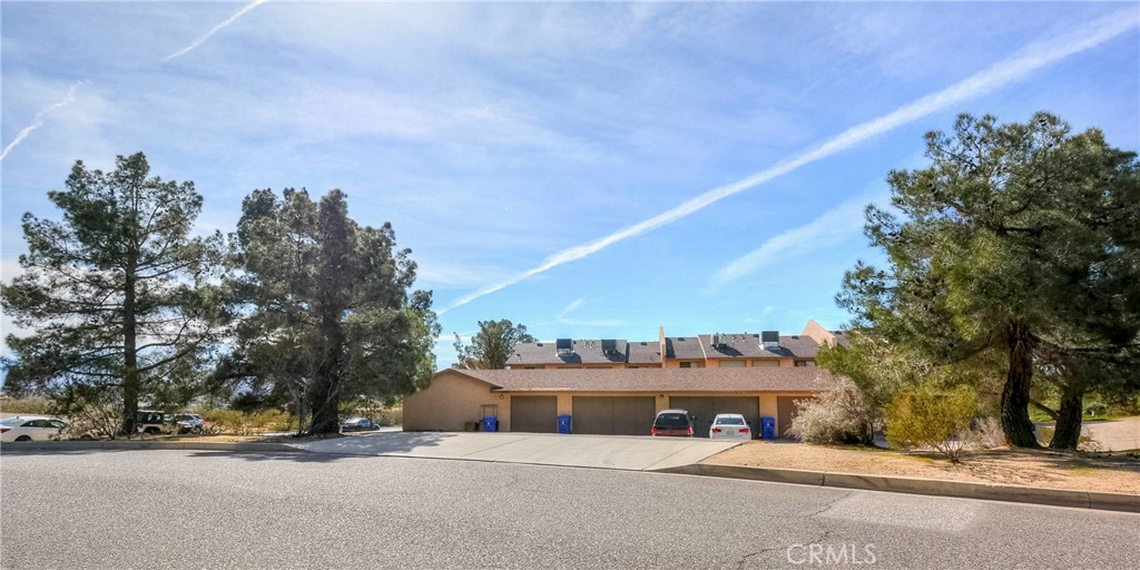 16462 Kalo Road Apple Valley, CA 92307 - Photo 3 of 22 a view of a building with a street