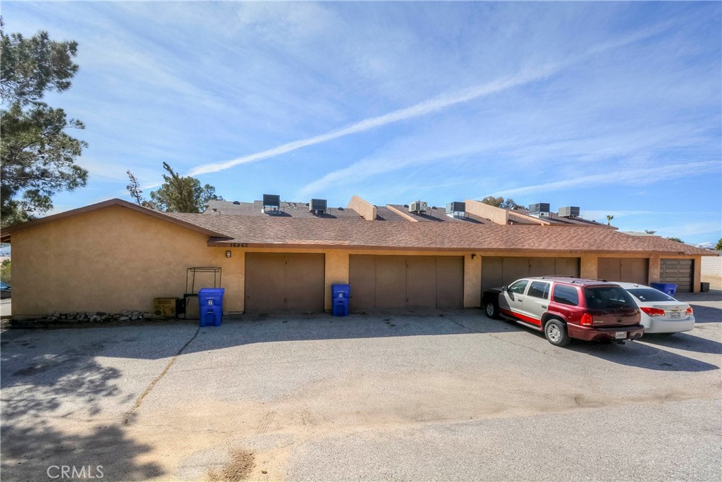 16462 Kalo Road Apple Valley, CA 92307 - Photo 5 of 22 a car parked in front of a house