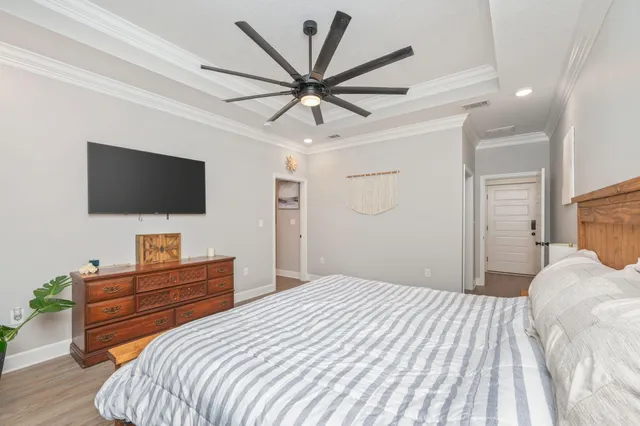 a bedroom with a bed and a walk in closet