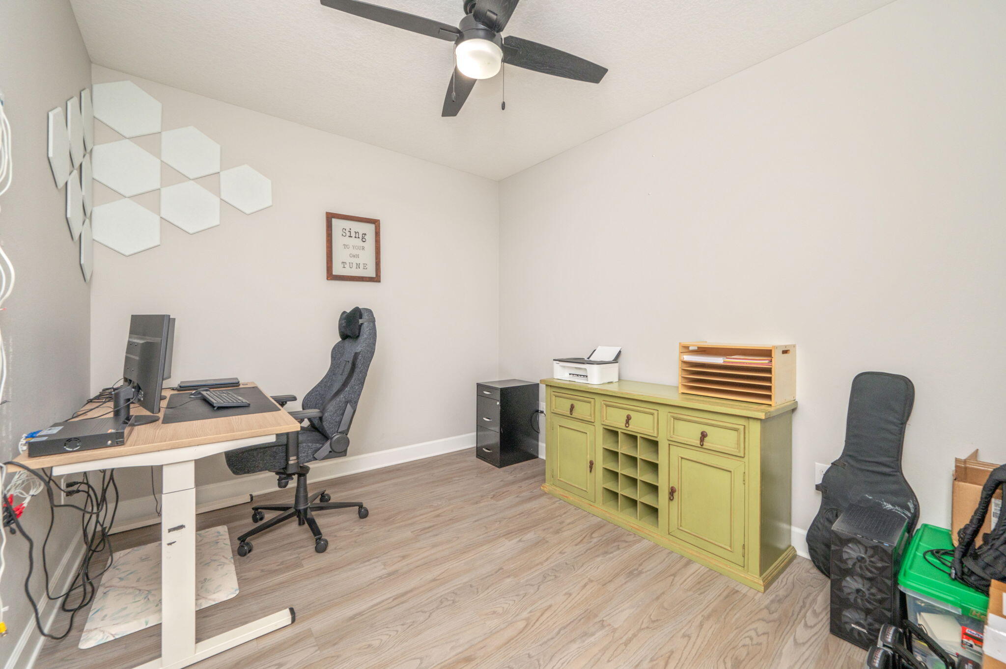 7934 Steel Mill Creek Road Laurel Hill, FL 32567 - Photo 30 of 63 a view of a workspace with furniture and a window