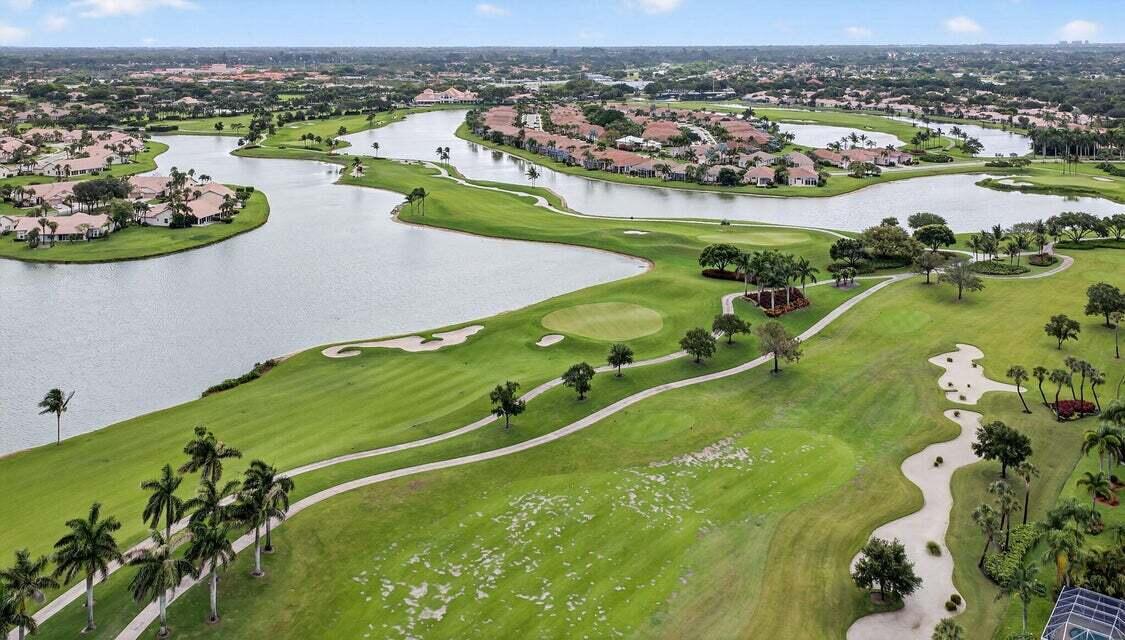 7737 Rockford Road Boynton Beach, FL 33472 - Photo 22 of 29 an aerial view of a residential houses with outdoor space