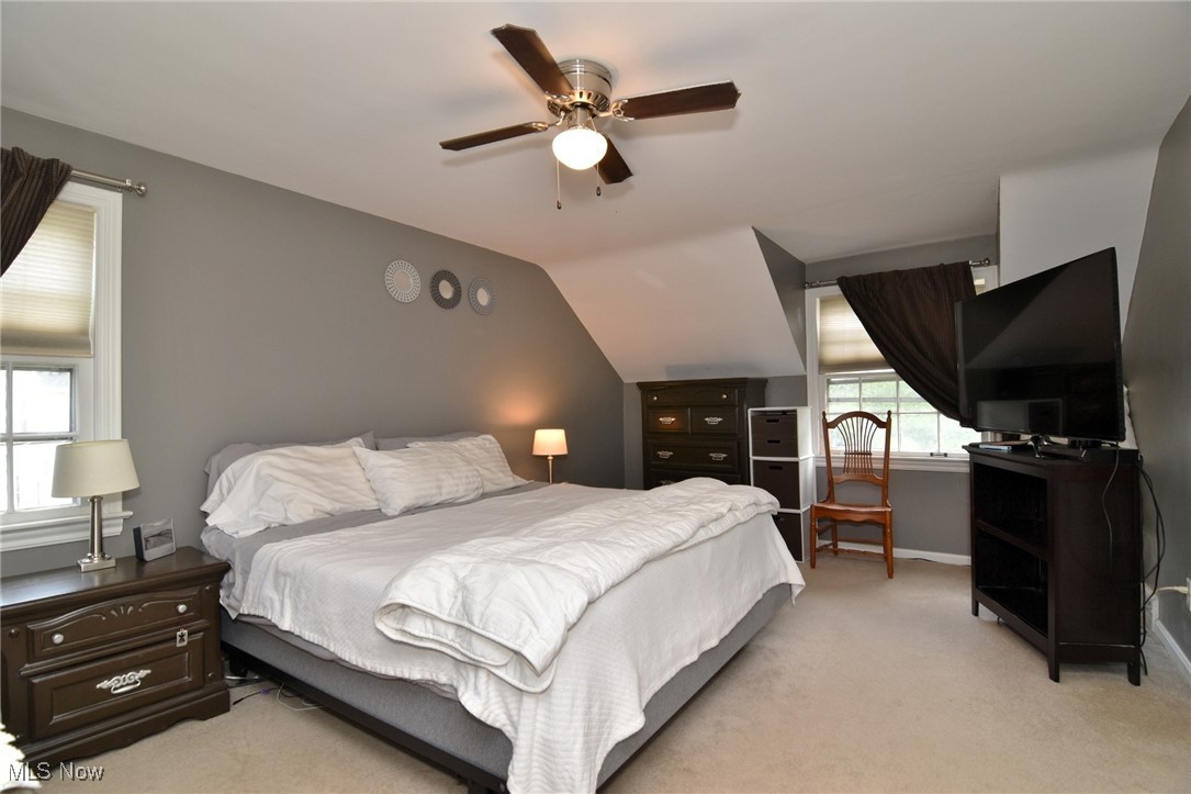 2278 Traymore Road Cleveland, OH 44118 - Photo 29 of 49 Bedroom featuring light carpet, ceiling fan, and lofted ceiling