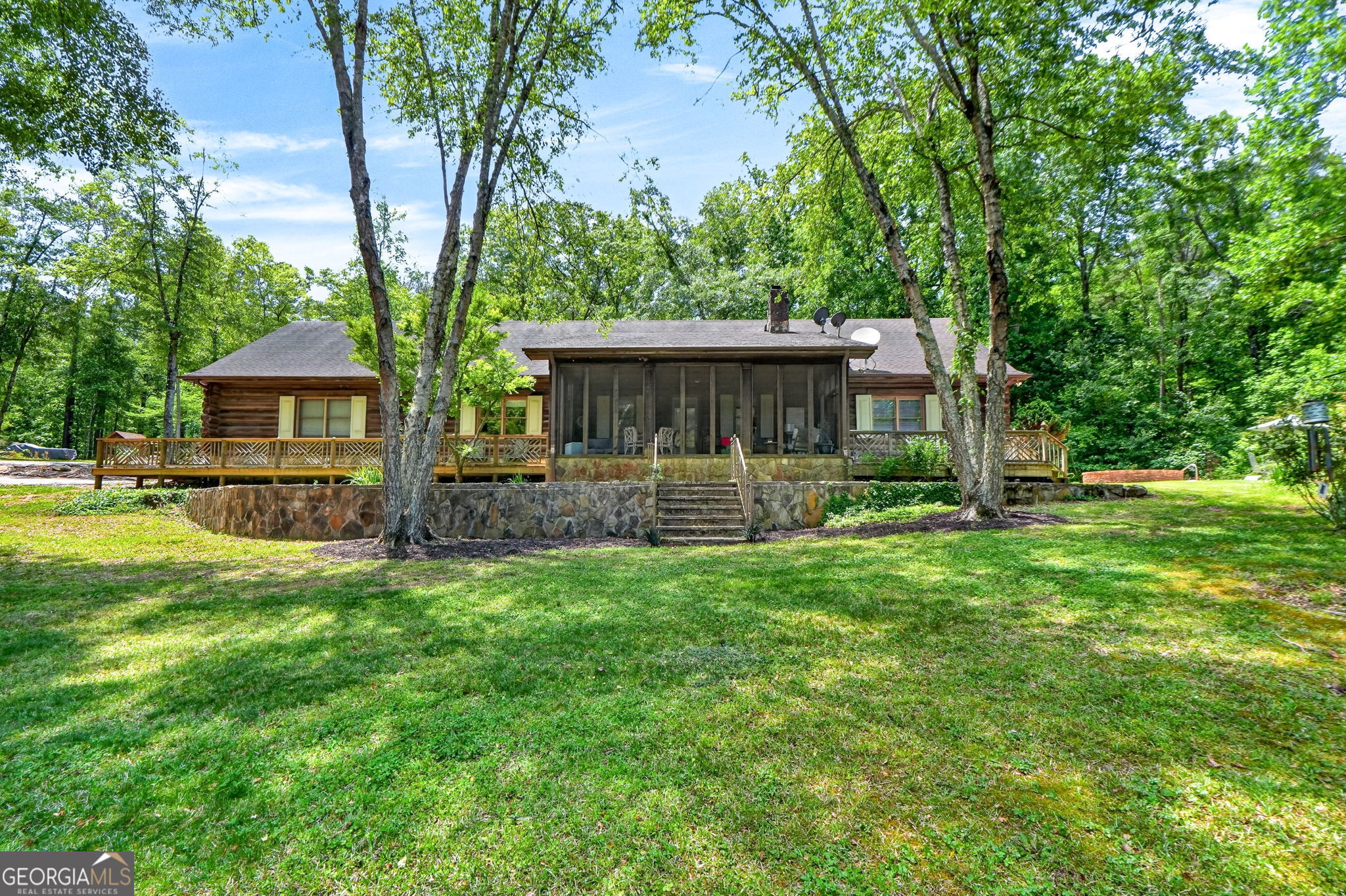 261 McIntosh Circle Jackson, GA 30233 - Photo 64 of 77 a front view of a house with yard and green space