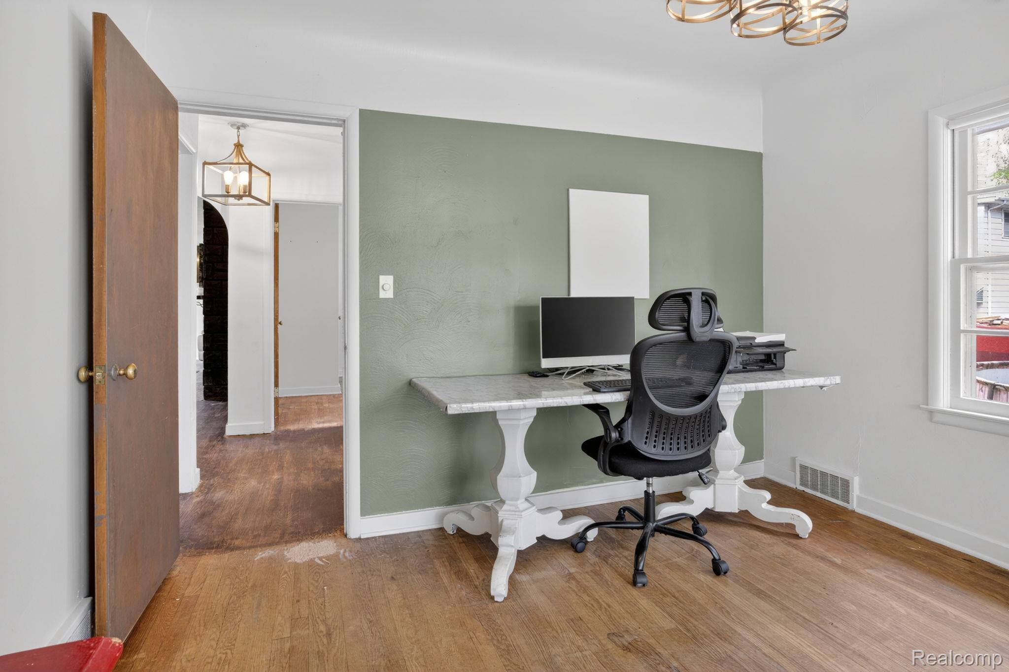 1209 Beatrice Street Flushing, MI 48433 - Photo 22 of 39 Office space featuring light wood finished floors and suspended lighting