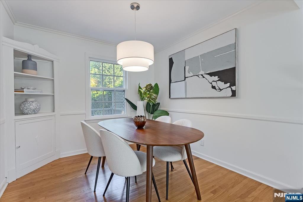 687 Grove Street Montclair, NJ 07043 - Photo 4 of 18 a view of a dining room with furniture and wooden floor