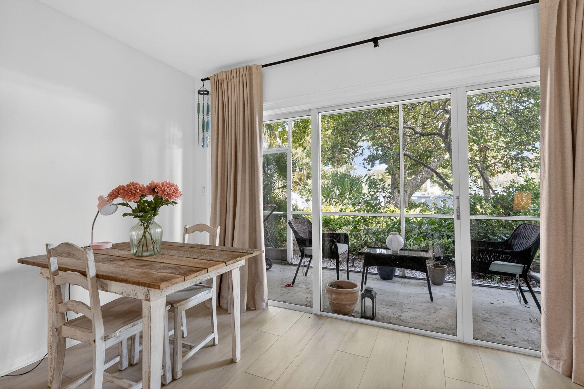 91 Willow Road, Unit 104 Tequesta, FL 33469 - Photo 9 of 25 View of Screen Porch/Sliding Doors