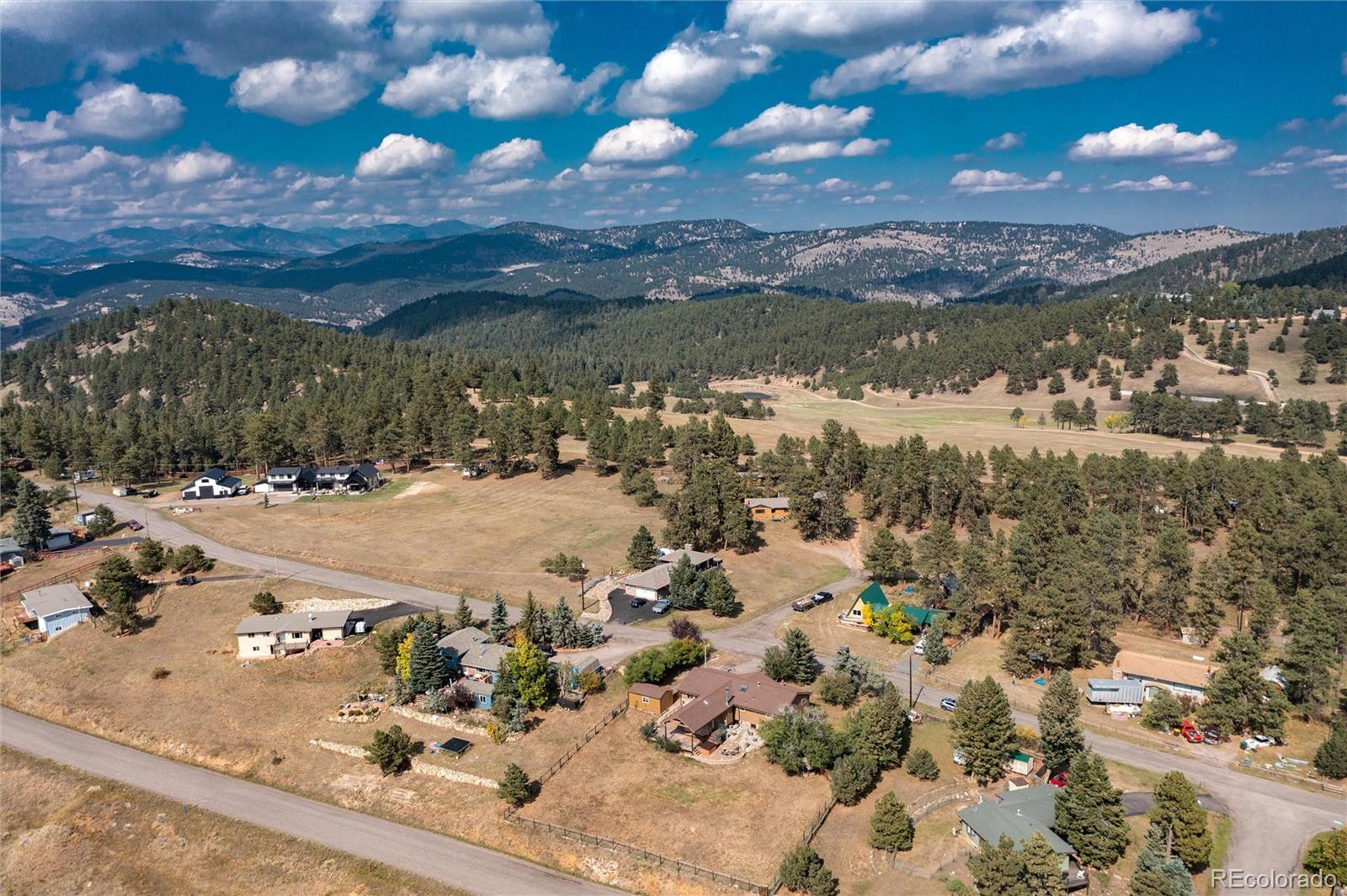 23724 Moqui Road Indian Hills, CO 80454 - Photo 2 of 39 a view of lake view and mountain view