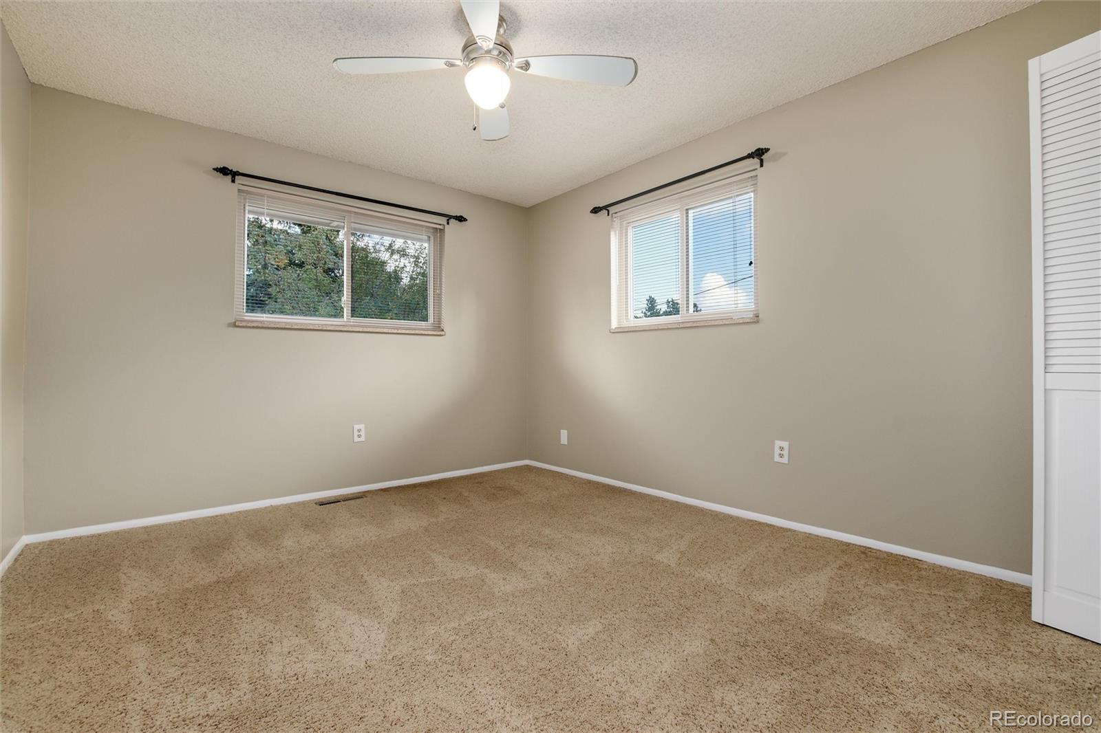 23724 Moqui Road Indian Hills, CO 80454 - Photo 25 of 39 an empty room with a window