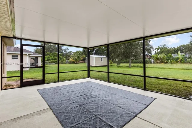 a picture of a room with windows