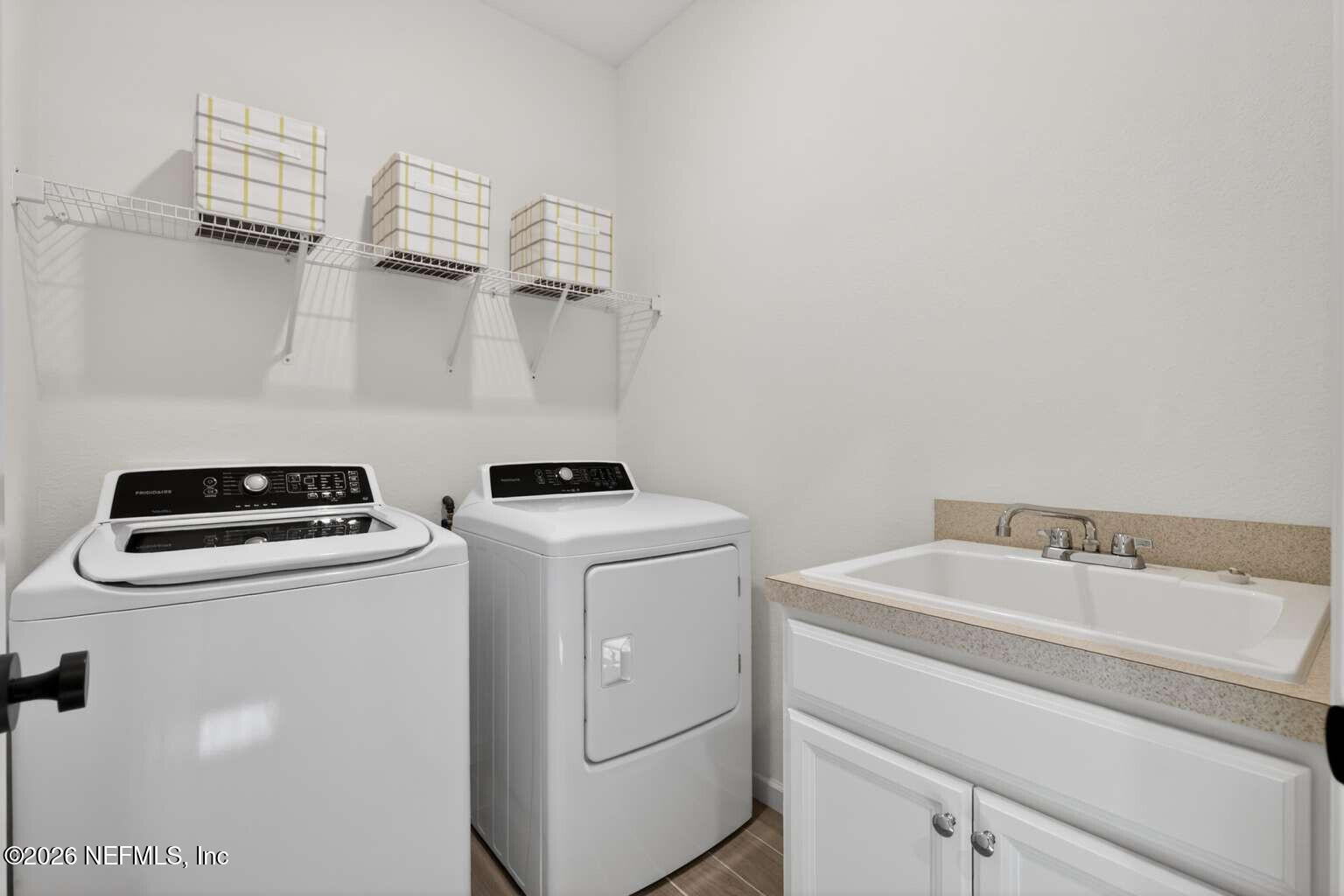339 Gan Way St. Johns, FL 32259 - Photo 16 of 20 a utility room with dryer and washer