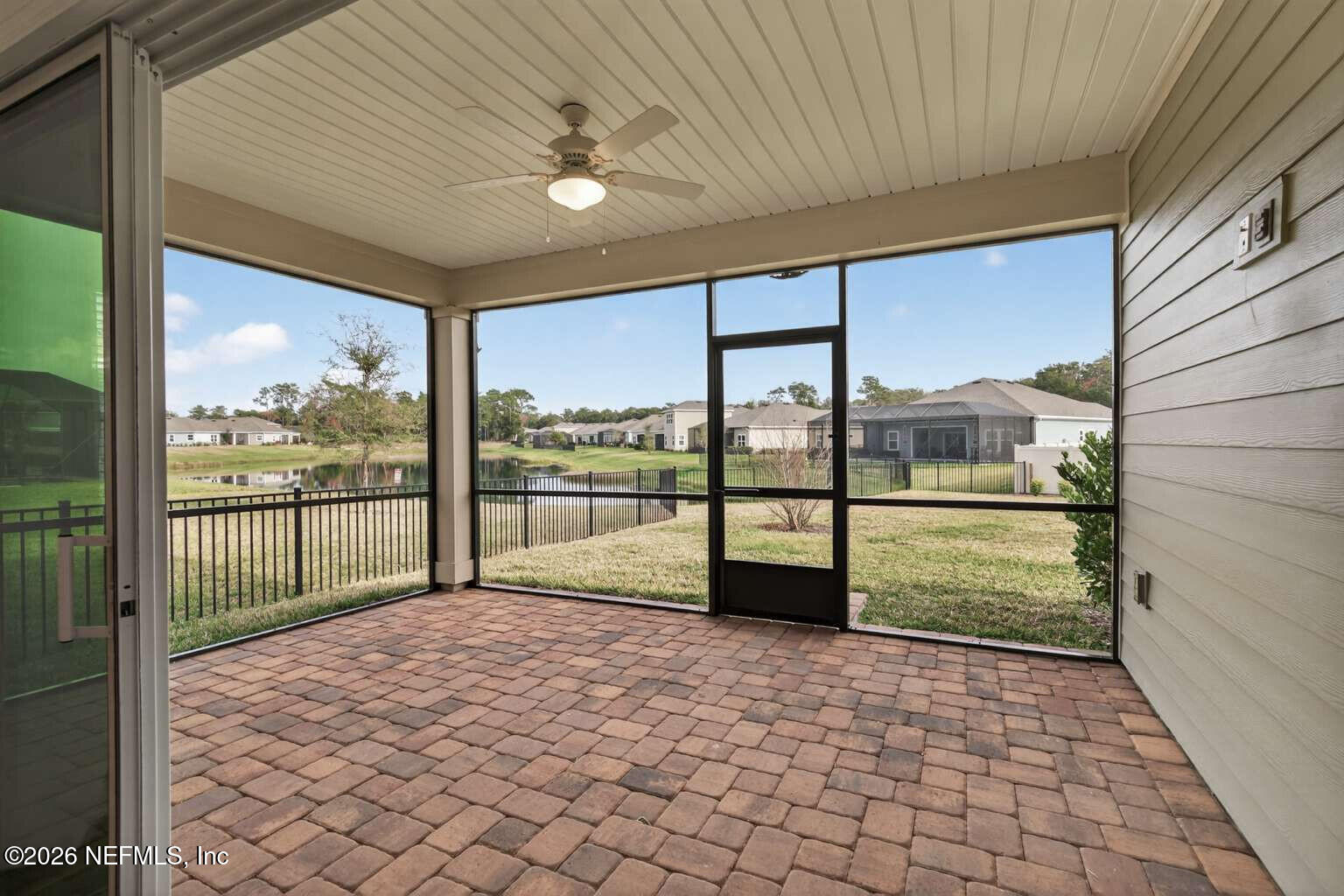 339 Gan Way St. Johns, FL 32259 - Photo 17 of 20 a view of porch with a floor to ceiling window