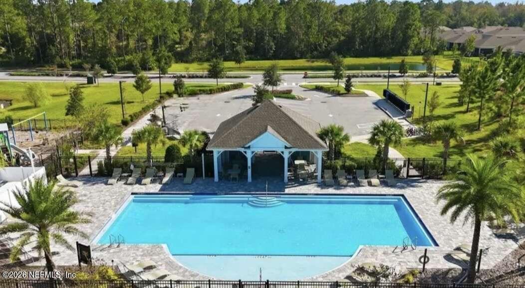 339 Gan Way St. Johns, FL 32259 - Photo 20 of 20 an aerial view of a house with a swimming pool