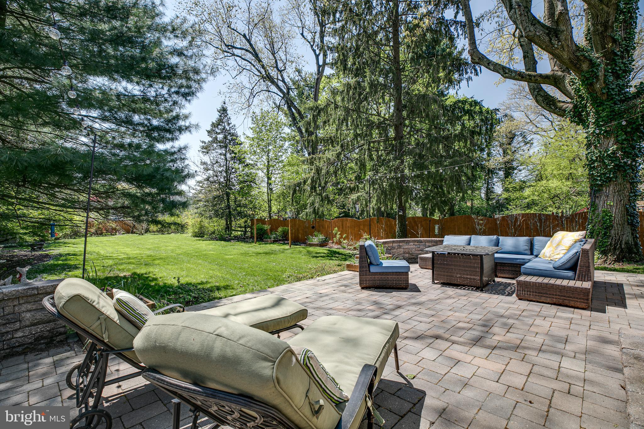 330 Old Lancaster Road Devon, PA 19333 - Photo 16 of 31 a view of backyard with seating area and green space