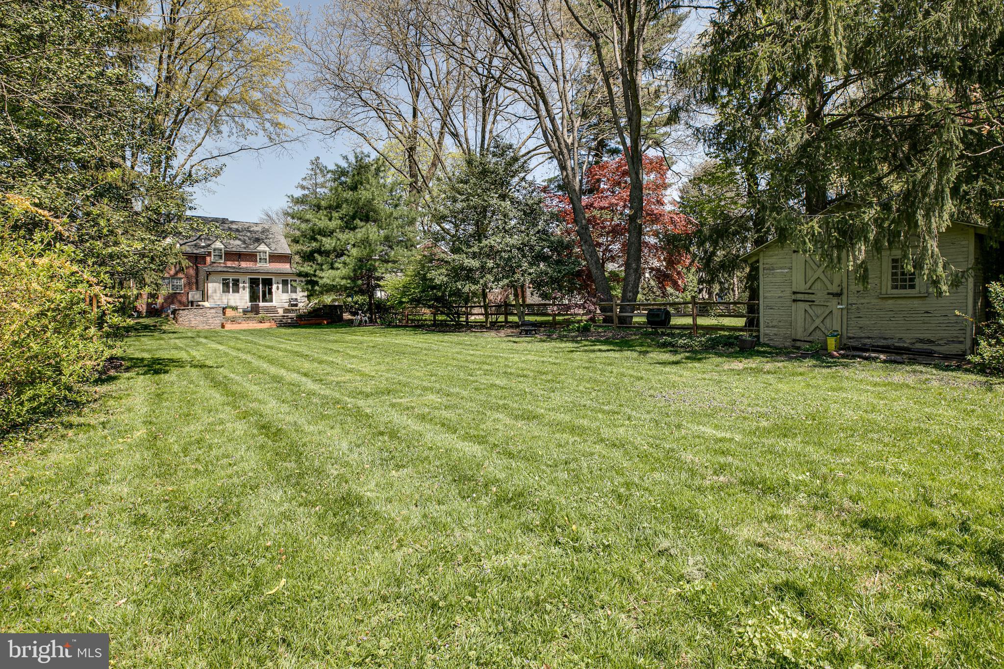 330 Old Lancaster Road Devon, PA 19333 - Photo 18 of 31 a backyard of a house with lots of green space