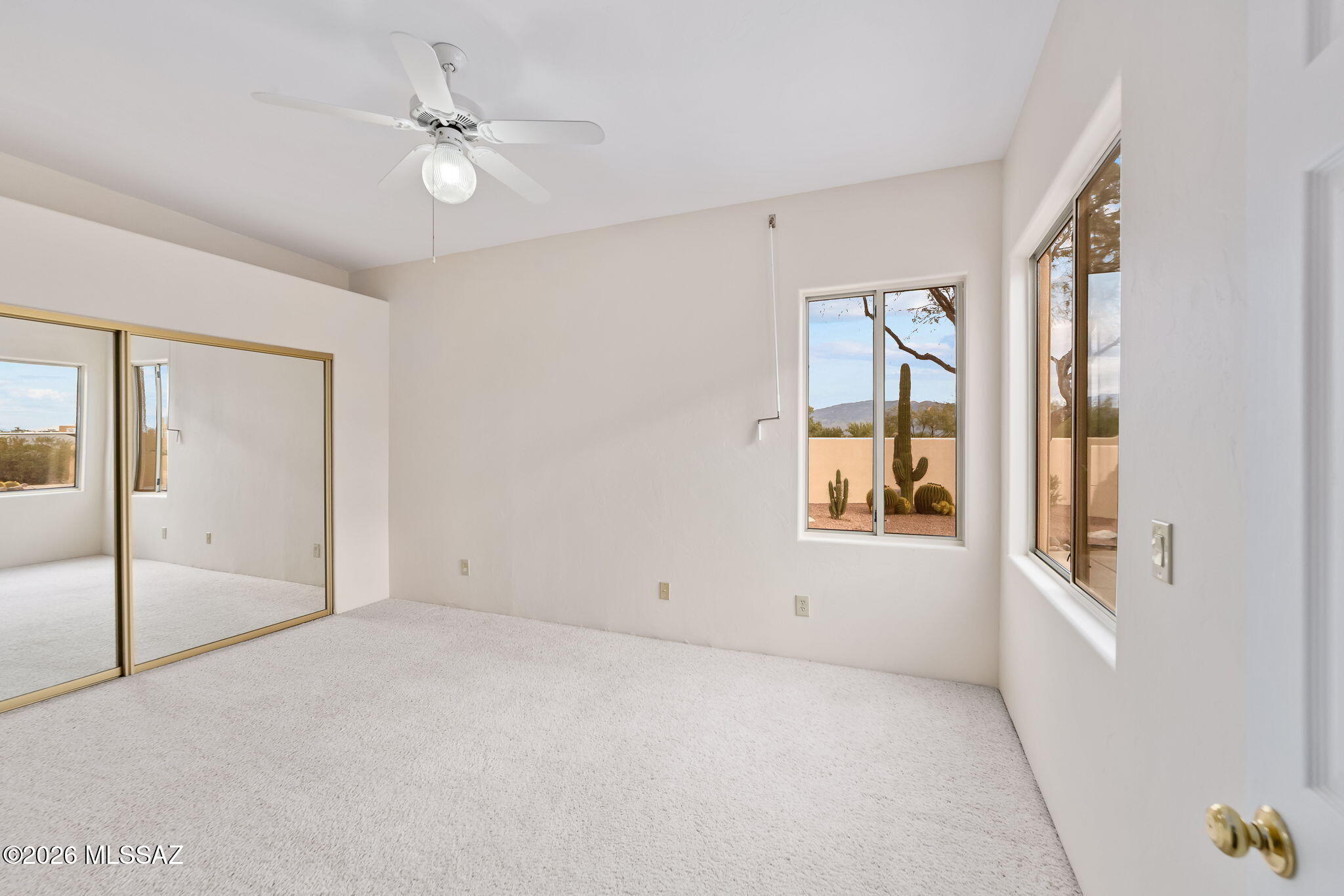3655 North Harrison Road Tucson, AZ 85749 - Photo 29 of 51 a view of an empty room with a window