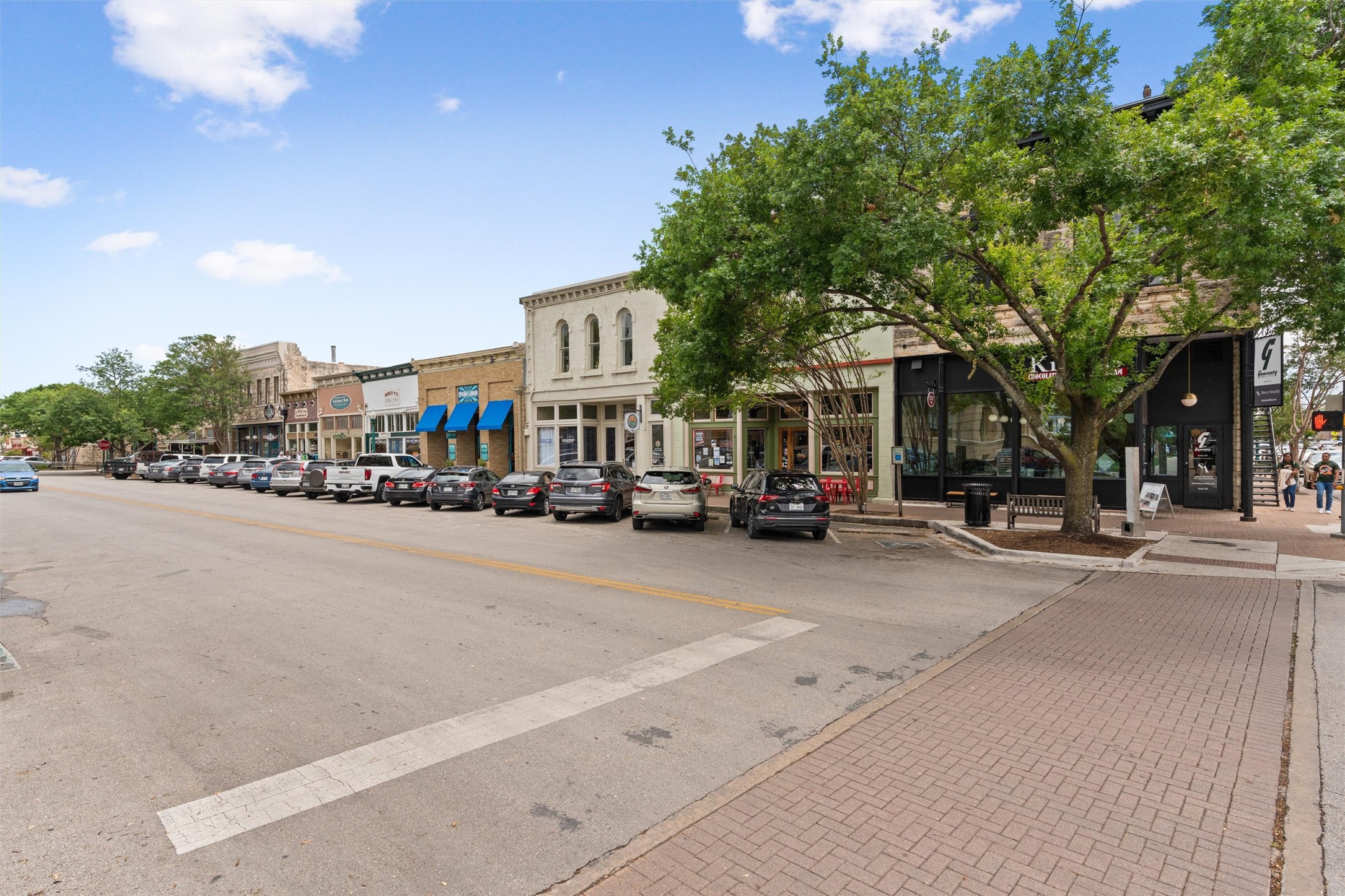 365 County Road 153 Georgetown, TX 78626 - Photo 26 of 35 a city street lined with buildings and trees
