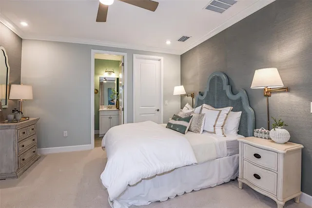 a bedroom with bed and window