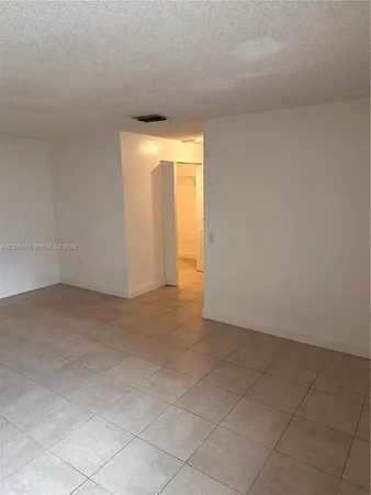 a bathroom with a shower and a toilet