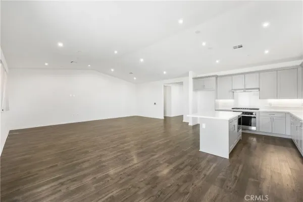 a view of kitchen with wooden floor