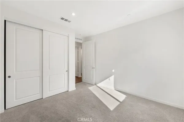 a view of small space with wooden floor