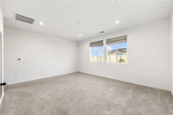a bathroom with a double vanity sink and mirror