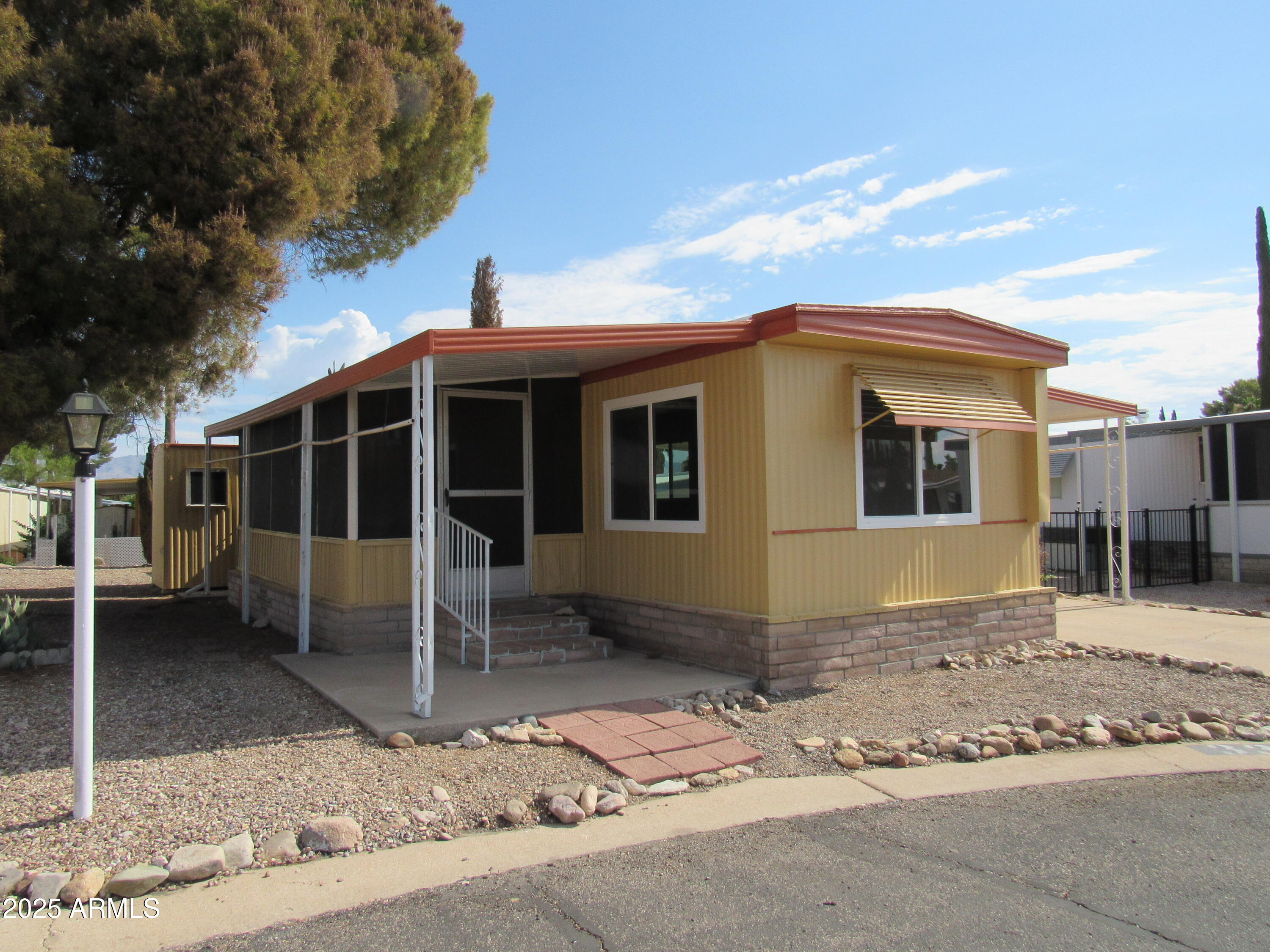 a front view of a house with a porch