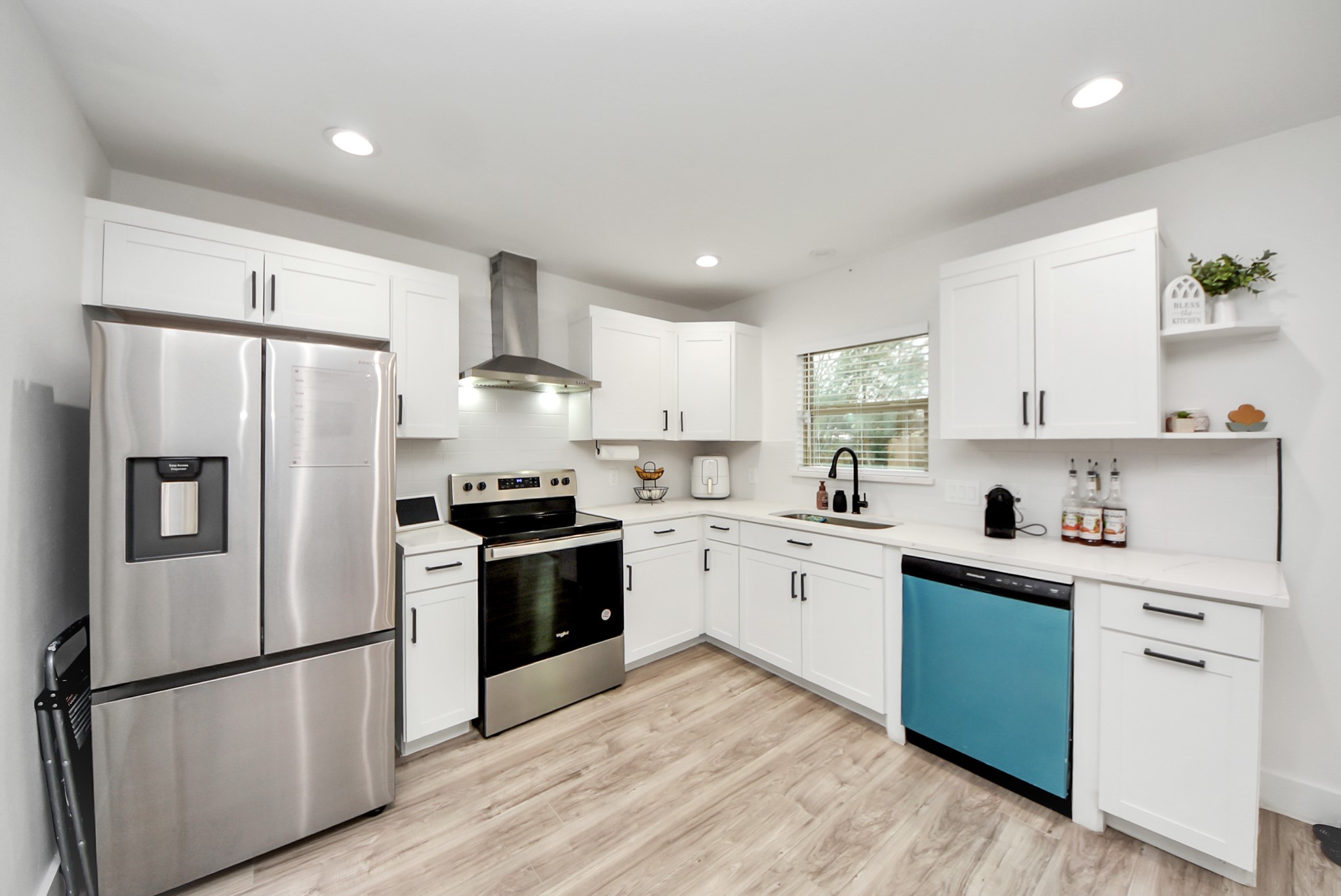 1110 Johnson Street Pasadena, TX 77506 - Photo 1 of 36 a kitchen with a refrigerator stove and sink