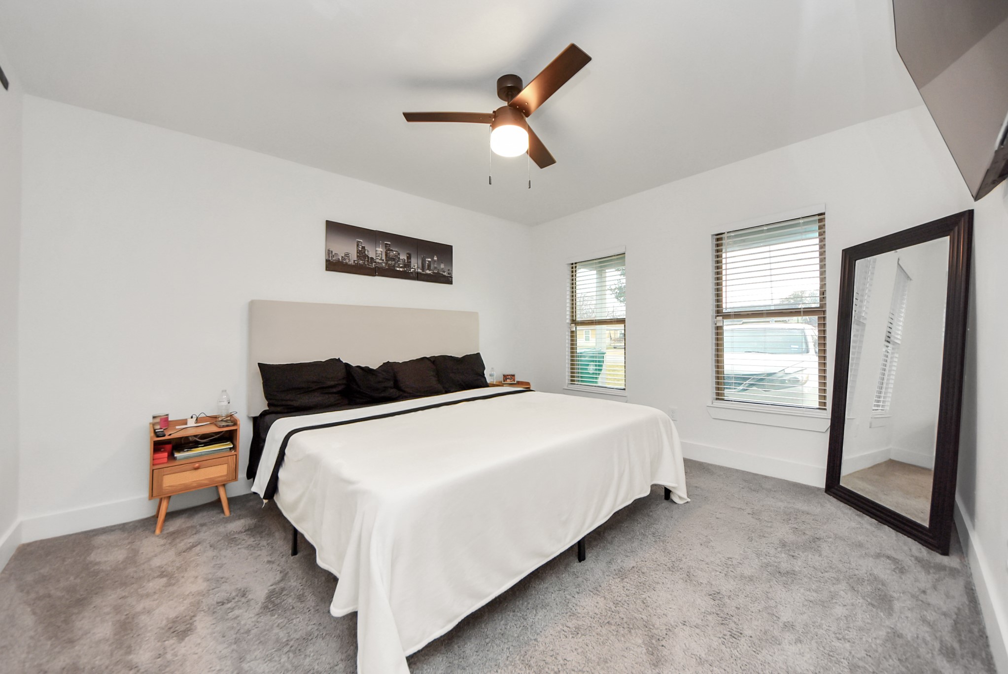 1110 Johnson Street Pasadena, TX 77506 - Photo 16 of 36 a bedroom with bed and a window