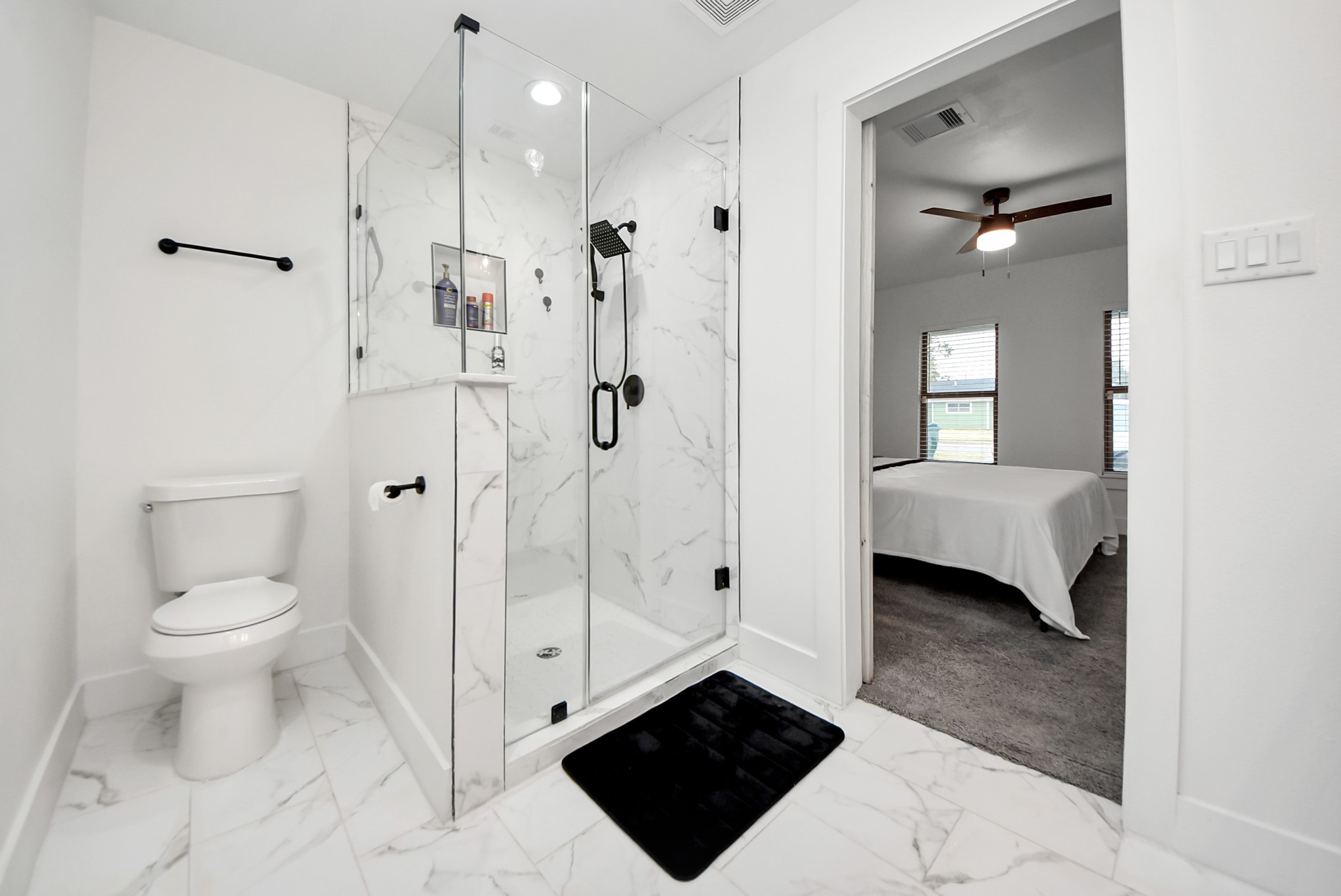 1110 Johnson Street Pasadena, TX 77506 - Photo 21 of 36 a bathroom with a shower a toilet and a sink