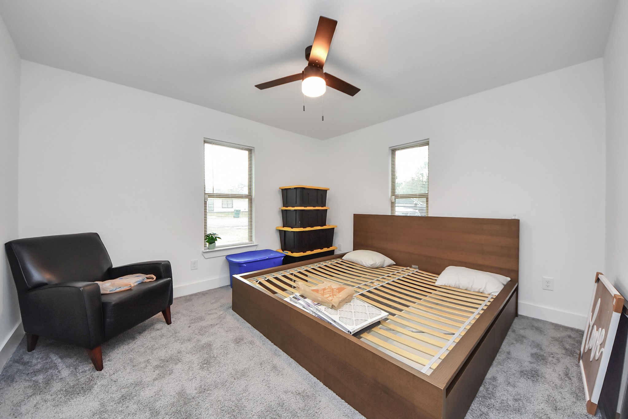 1110 Johnson Street Pasadena, TX 77506 - Photo 24 of 36 a bedroom with a bed and wooden floor