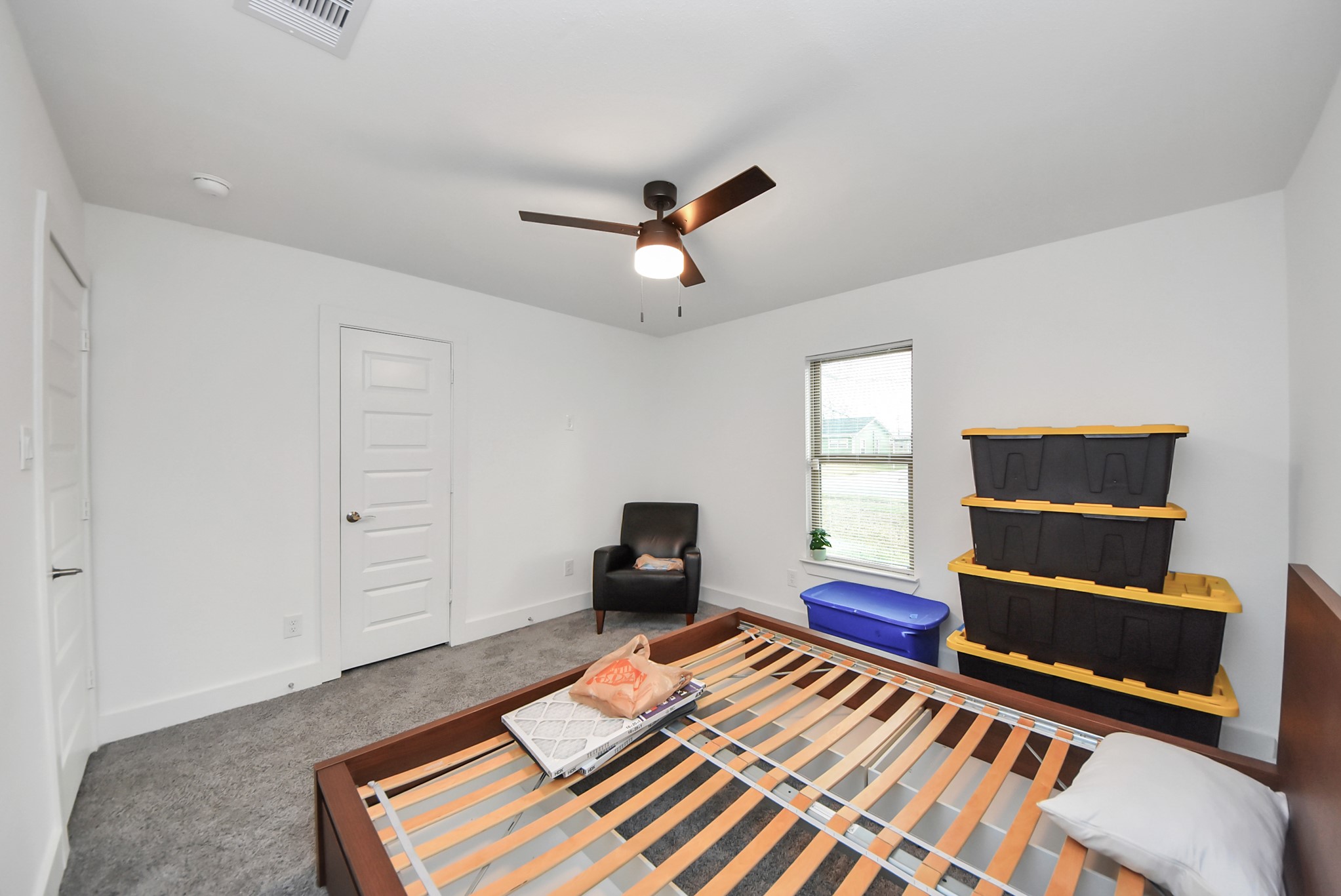 1110 Johnson Street Pasadena, TX 77506 - Photo 26 of 36 a bedroom with a bed and wooden floor